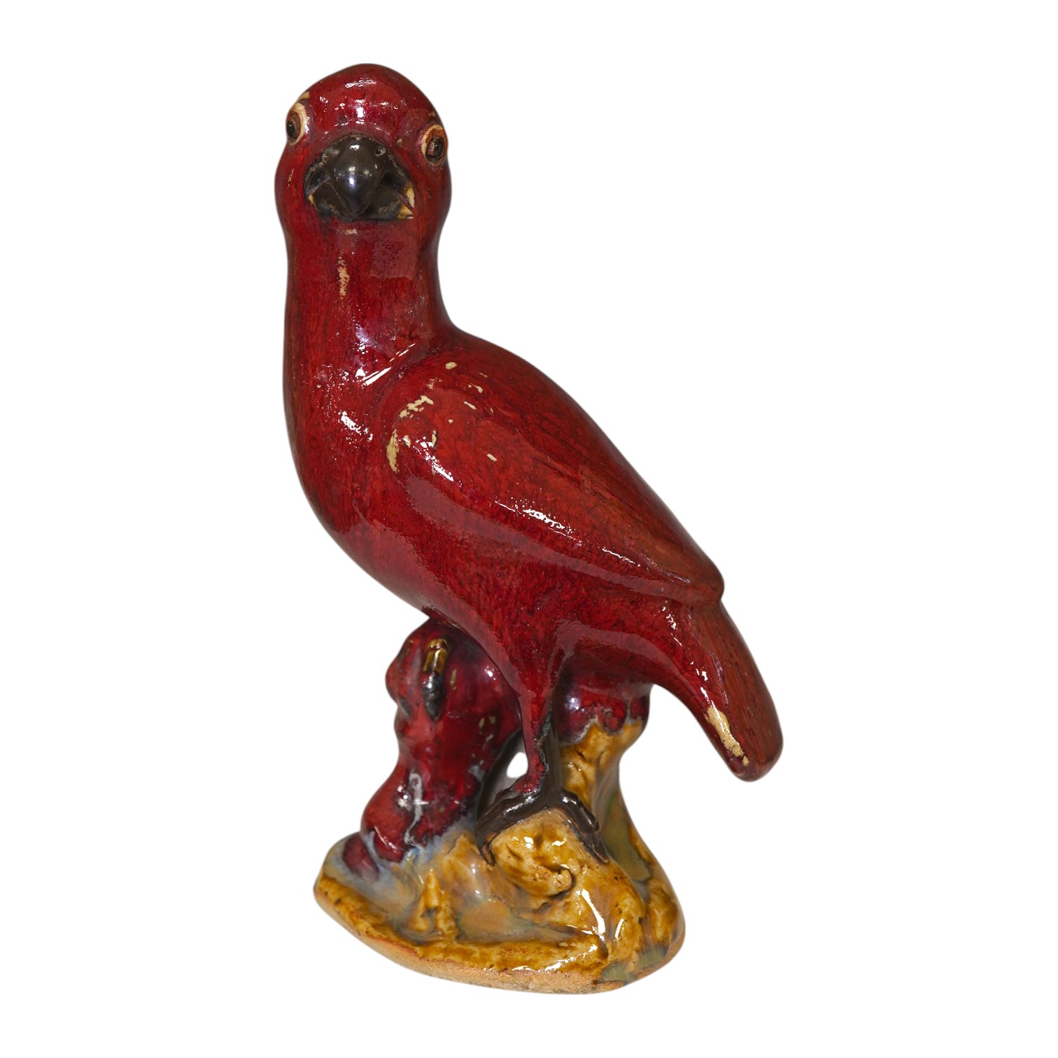 A Chinese flambé glazed figure of a bird, 20.5cm high. Condition - fair to good.